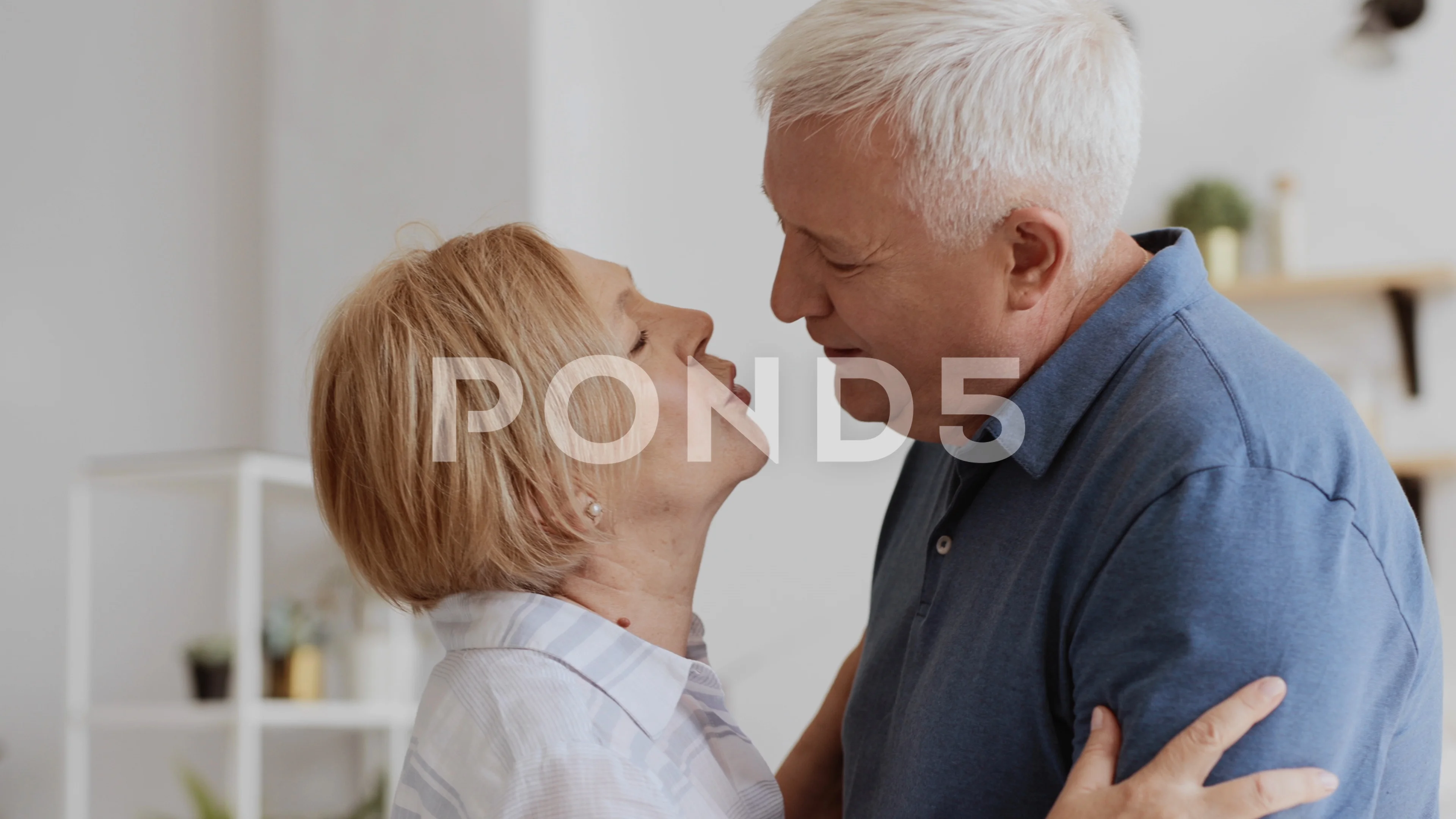 Old men kissing
