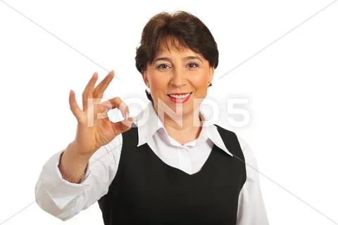 Happy mature woman show okay sign Stock Photos