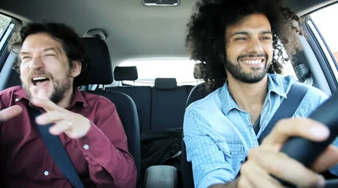 Happy men dancing driving car happy Stock Footage 37111236
