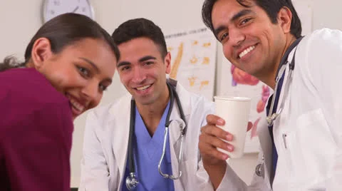 Happy Mexican doctors taking their coffee break Stock-Footage 25629959