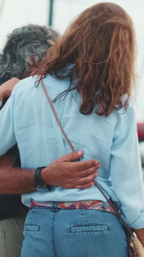 Happy middle aged couple walking in the port Video stock 250841880