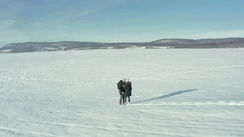 Happy middle-aged couple in winter clothesn kissing each other Stock Footage 149213152