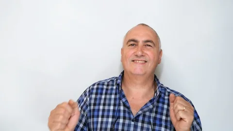Happy middle aged man dancing isolated on white background. Video stock 115413153