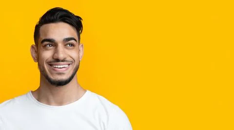 Happy middle-eastern man looking at copy space Stock Photos