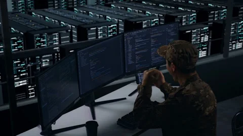 Happy Military Looking At Code On Phone While Write Code In Data Center Stock Footage 271149148