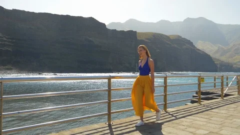 Happy model walking in portside Stock Footage 106050346