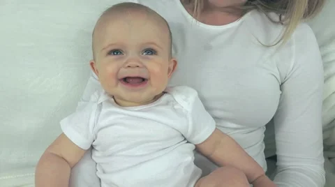 Happy Mom and Baby - 4K SteadiCam Stock-Footage 50076853