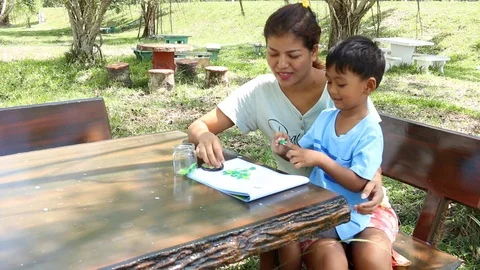 Happy Mom and son working home work Stock-Footage 73724019