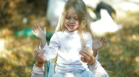 Happy Mother and Child Playing Outdoors Stock Footage
