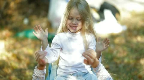 Happy Mother and Child Playing Outdoors Stock Footage