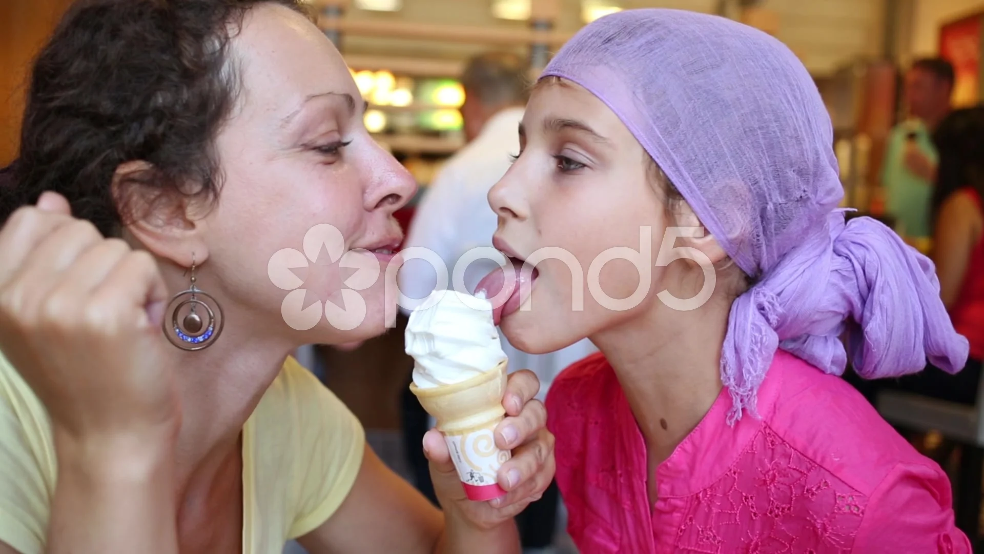 Mom daughter licking