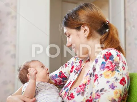 Happy mother with baby Stock Photos