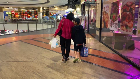 Happy Mother &amp; Son Walking In Empty Modern Asia Thailand Shopping Mall Stock Footage 247418122