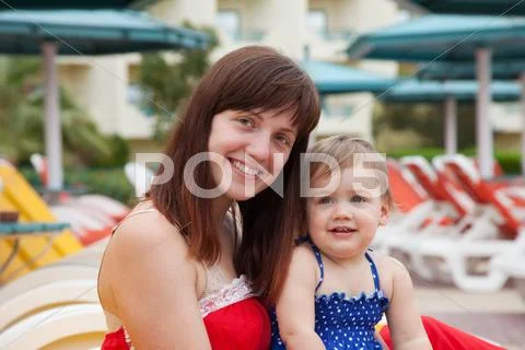 Happy mother with toddler at resort Stock Photos