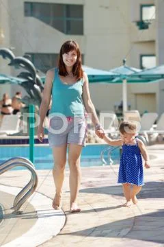Happy mother with toddler at resort Stock Photos