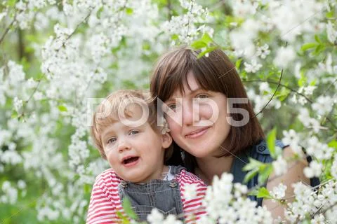Happy mother with toddler in spring Stock Photos