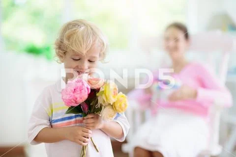 Happy mothers day. Child with present for mom. Stock Photos