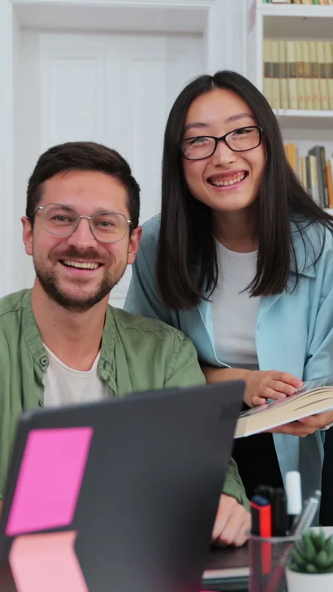 Happy multi ethnic college students smiling look at camera Stock Footage 345144414