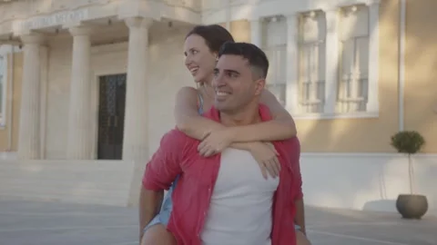 Happy multi-ethnic couple having fun doing sightseeing on summer vacation Stock Footage 281339745