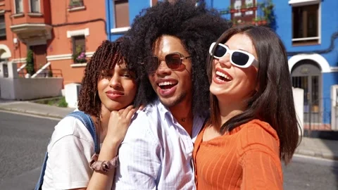 Happy multi ethnic friends taking selfies on a sunny day Stock Footage 309200086
