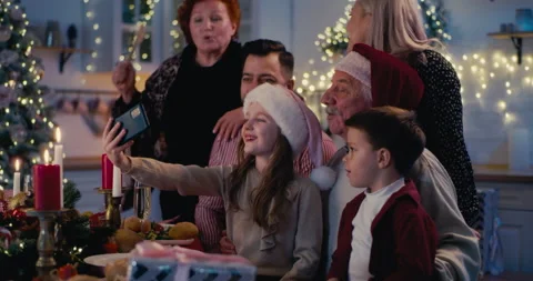 Happy multi generational family taking Christmas selfie Stock Footage