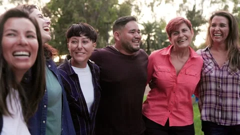 Happy multi-generational group of friends smiling together at camera   Stock Footage 246294294