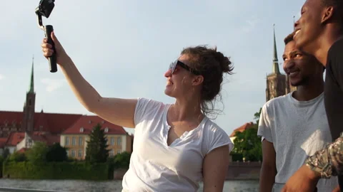 A happy multi-racial group of students in the city. Young black men and white Stock Footage 137108995