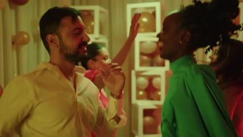 Happy multiethnic couple dancing at elegant luxury party with glamour Stock Footage 294564909