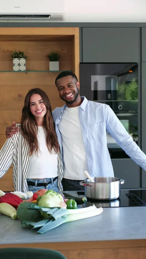 Happy Multiethnic Couple Smiling and Preparing 스톡 동영상 334014711