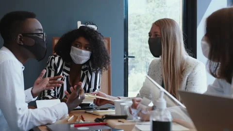 Happy multiethnic creative start-up business people talk at meeting at light Stock Footage 137743402