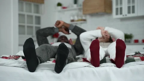 Happy multinational couple feet dancing Stock-Footage 148684409