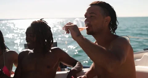 Happy multiracial friends having fun drinking champagne at boat party Stock Footage 199236754