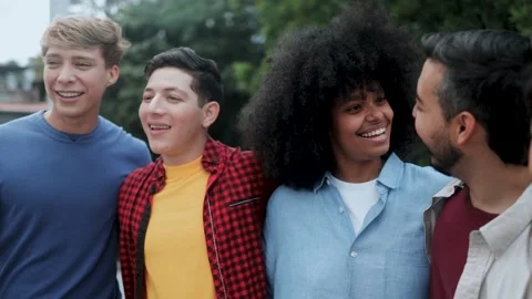 Happy multiracial friends having fun together outdoors - Group of young people Stock Footage 320852737
