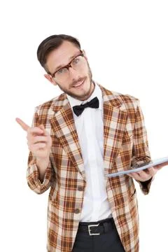 Happy nerd holding tablet pc and pointing Stock Photos