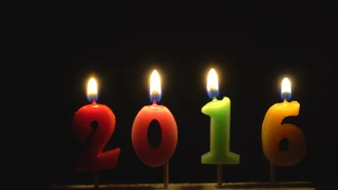 Happy new year 2016 celebration. Colorful burning candles in the form of numbers Stock Footage
