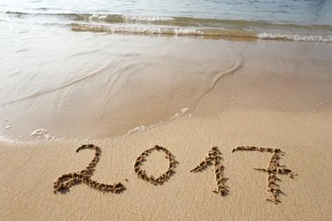 Happy New Year 2017 on the beach Stock Photos