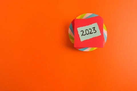 Happy new year 2023 background with number handwritten on sticky note Stock Photos