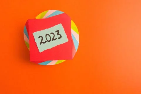 Happy new year 2023 background with number handwritten on sticky note Stock Photos