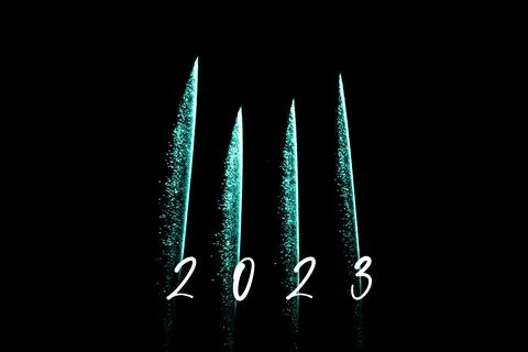 Happy new year 2023 turquoise fireworks rockets new years eve. Luxury firewor Stock Photos