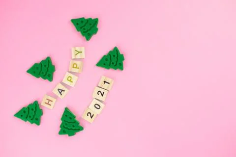 Happy New Year and Merry Christmas. Scrabble letters, playdough and plasticin Stock Photos