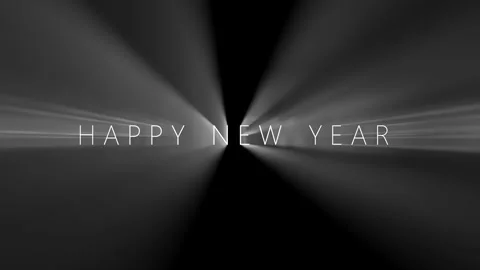 Happy New Year text engraved in a black background and lit from behind reve.. Video stock 286416182
