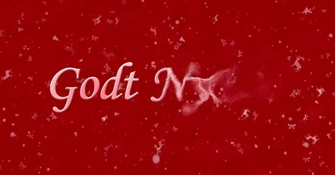 Happy New Year text in Norwegian "Godt nyttar" turns to dust from bottom on red Stock Footage 70454591