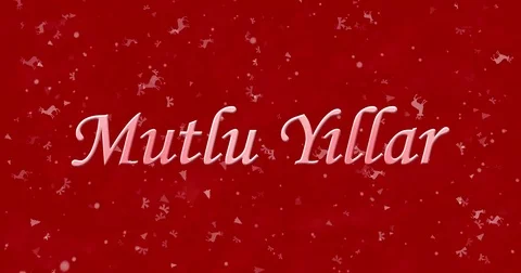 Happy New Year text in Turkish "Mutlu Yillar" formed from dust and turns to dust Stock Footage 70474433