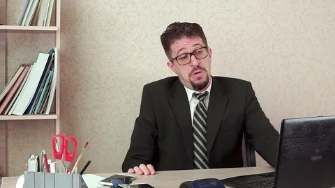 Happy office Manager man with beard and glasses. Happy, shows his thumb up. 動画素材 100403865