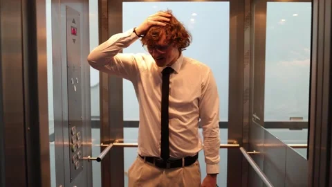 Happy office worker feels joy in elevator Stock Footage 333969776