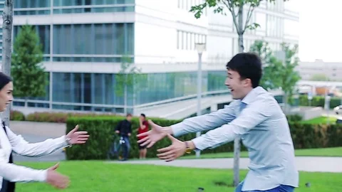 Happy office workers having fun outdoors in the park Video stock 77167398