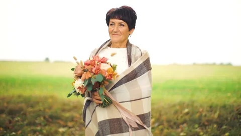 Happy old age. An elderly beautiful couple walking in the Park. Stock Footage 106401366