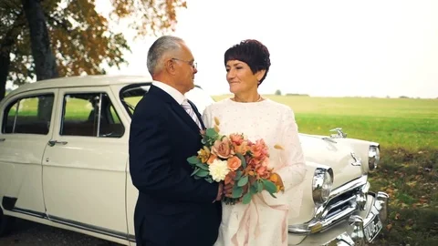Happy old age. An elderly beautiful couple walking in the Park. Stock Footage 106402035