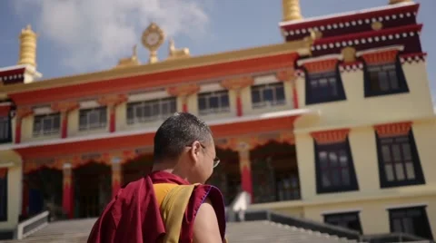 Happy old Buddhist Monk walking to new temple Stock Footage 60196653