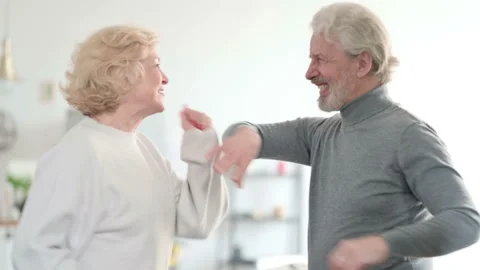 Happy Old Couple Dancing Together at Home Video stock 148200360